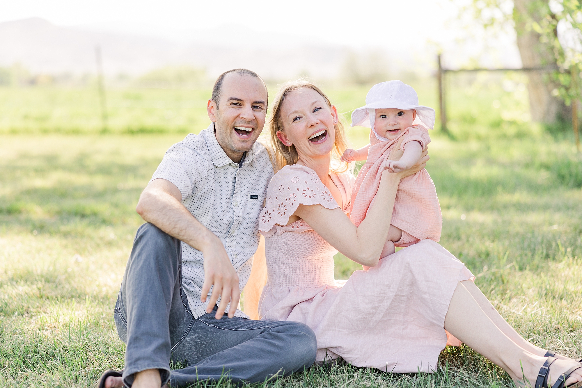 family of three during CO Apple Orchard Mini Sessions at Ya Ya Orchard