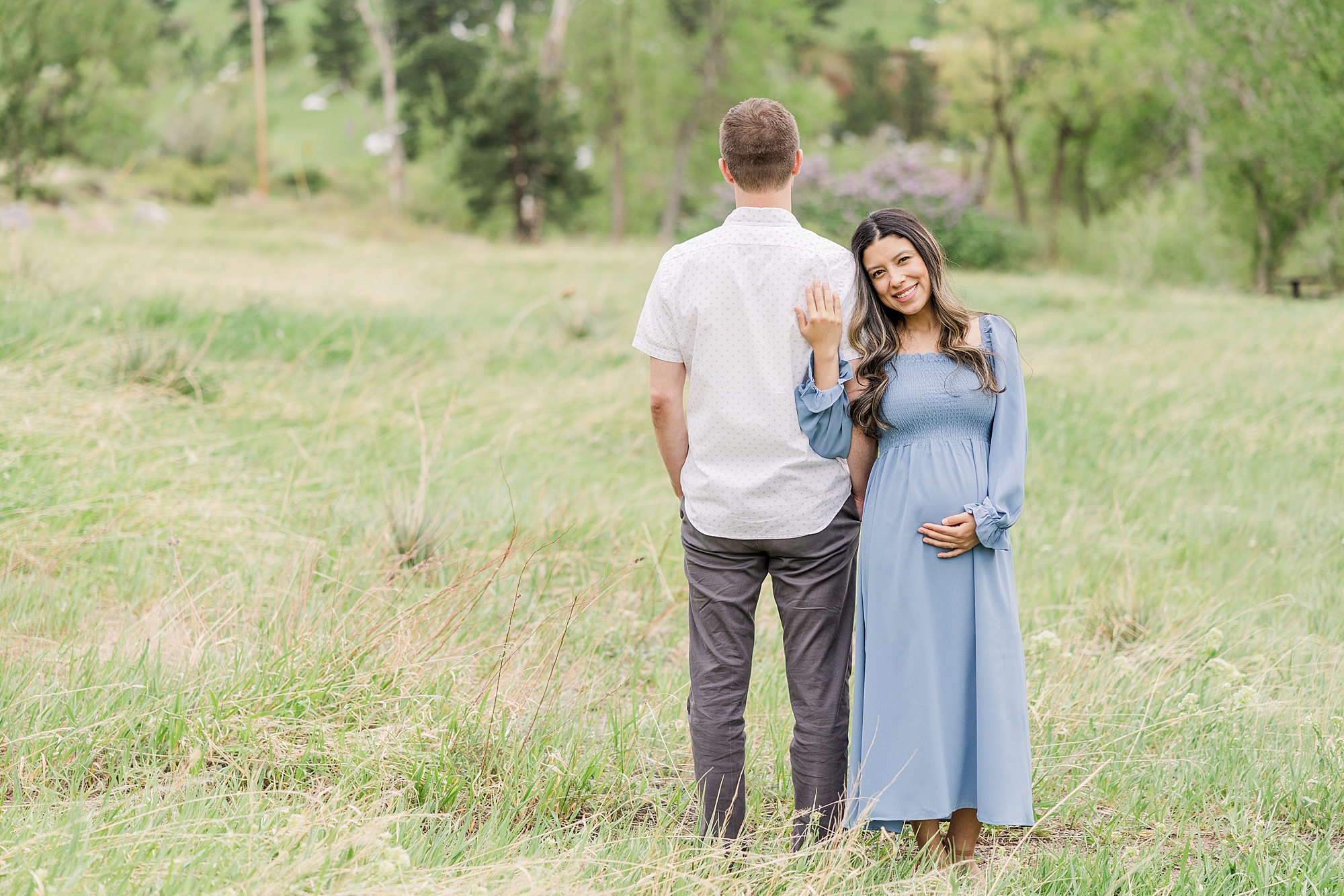 expectant parents during maternity session by Colorado Maternity Photographer