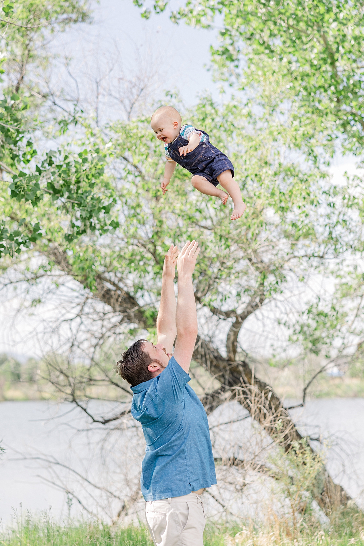 dad plays with his son during Father's day mini session