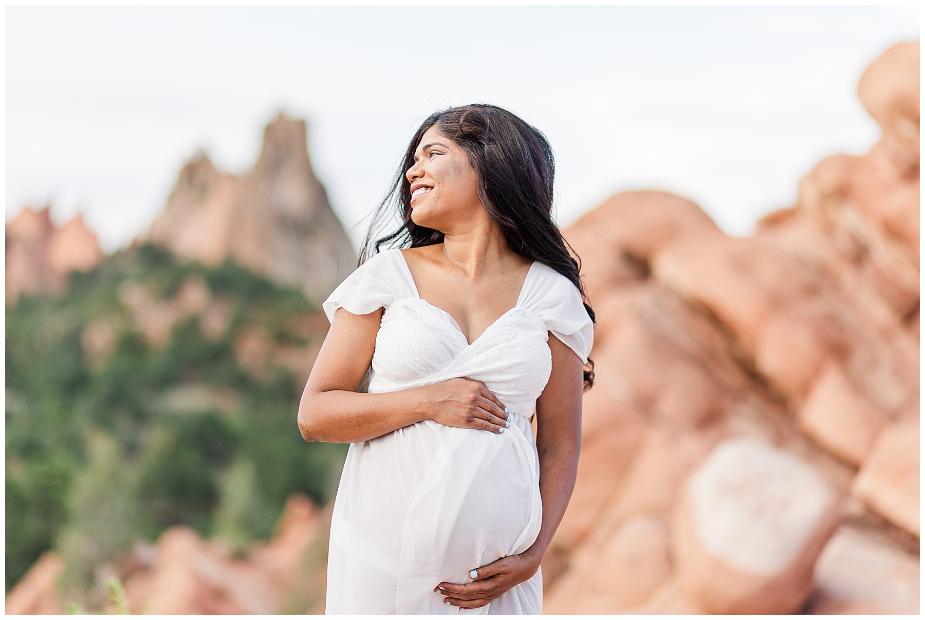 Garden of the Gods maternity session mom looking away