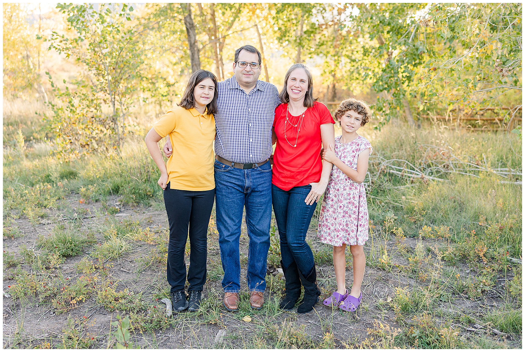 family of four in Boulder Colorado during fall mini sessions