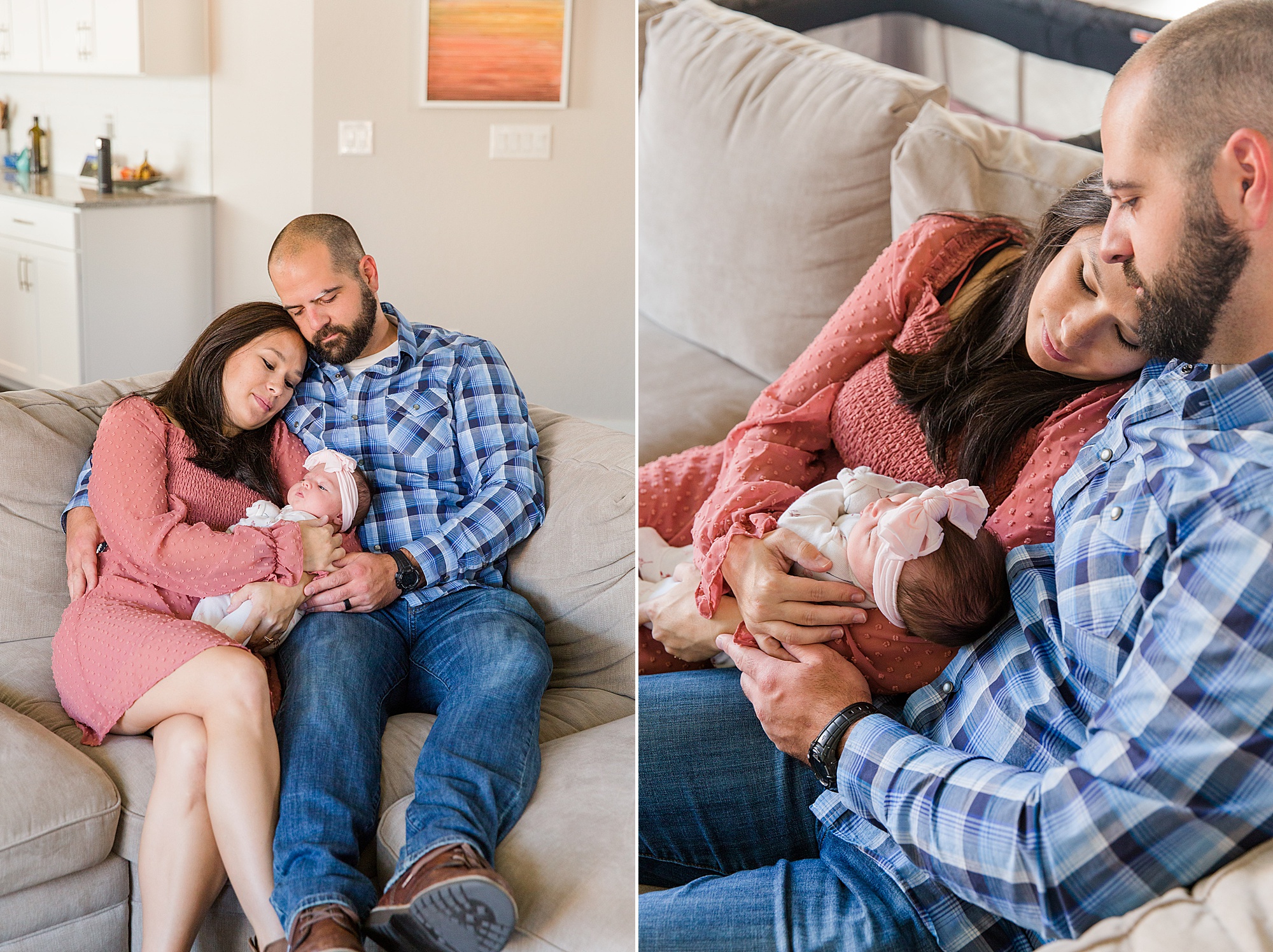 parents cuddle on their couch holding their newborn