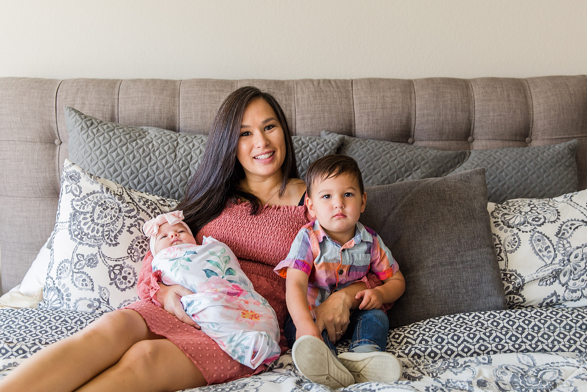 mom sits with her son and baby girl during family lifestyle session