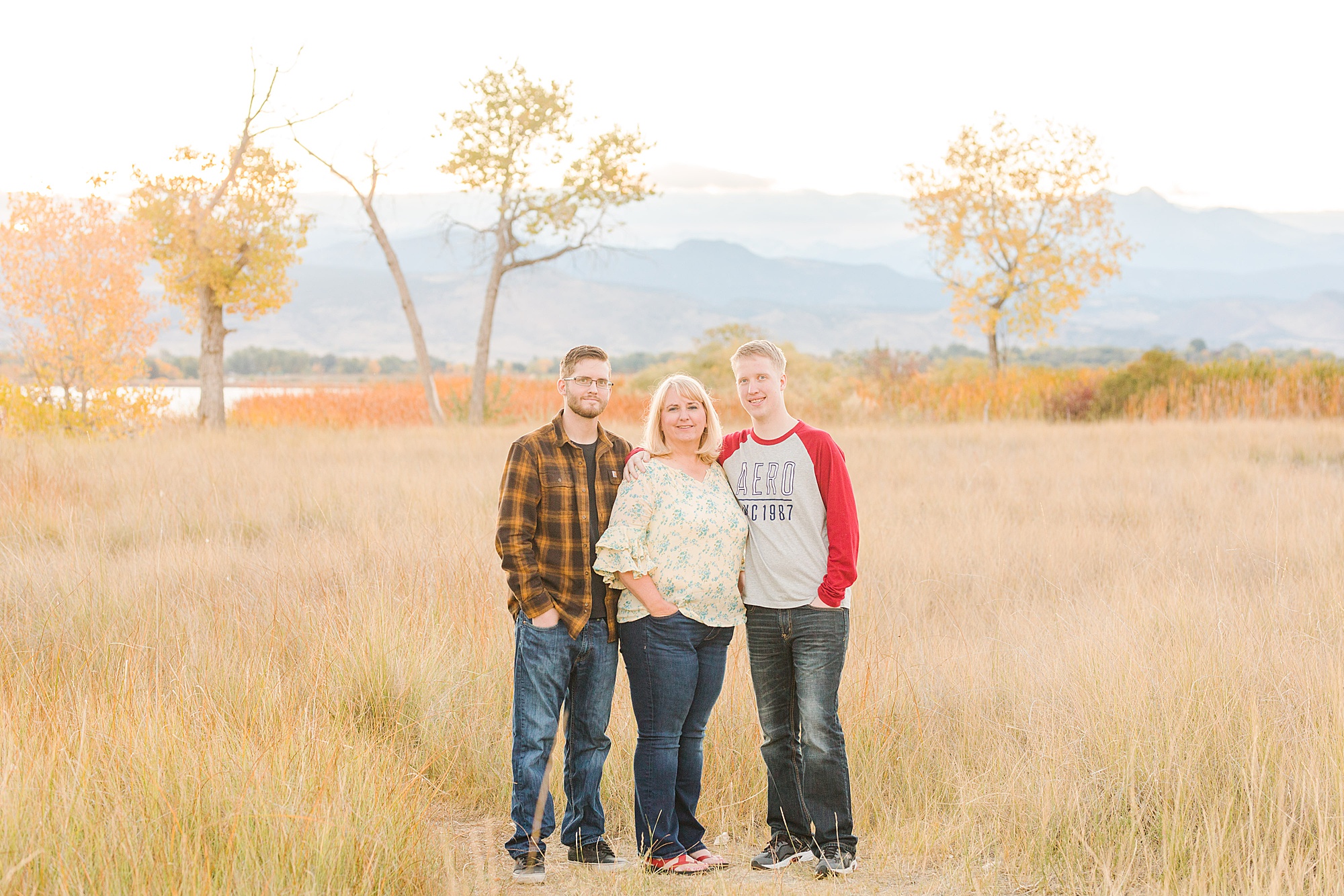 mom with 2 sons during Fall Family Mini Sessions in Longmont Colorado