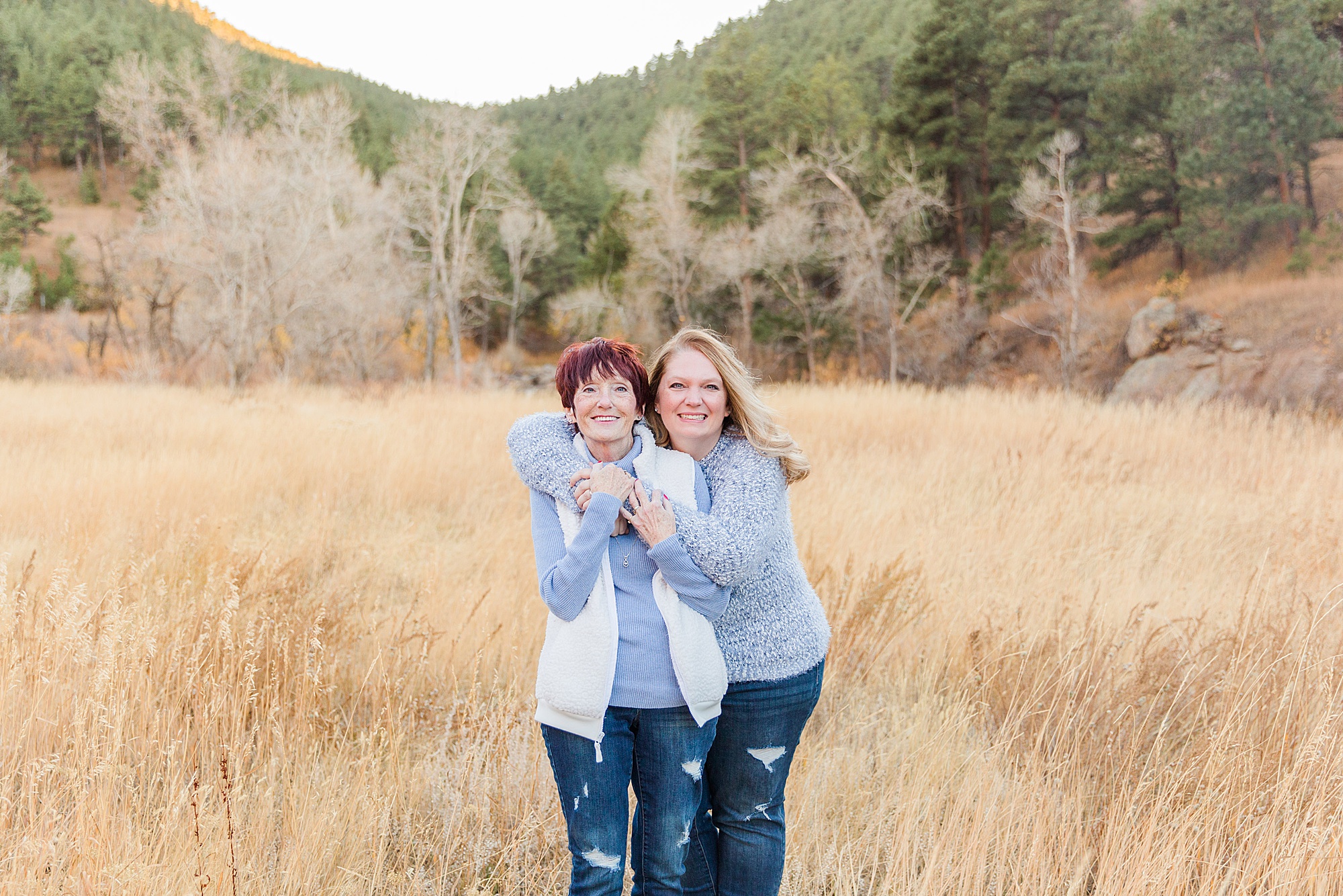 mom and daughter in tall grass at Buckingham Park Family Session in Boulder, CO