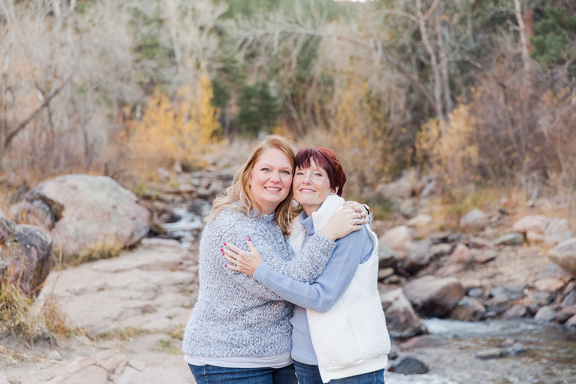 mother and daughter hug during family session