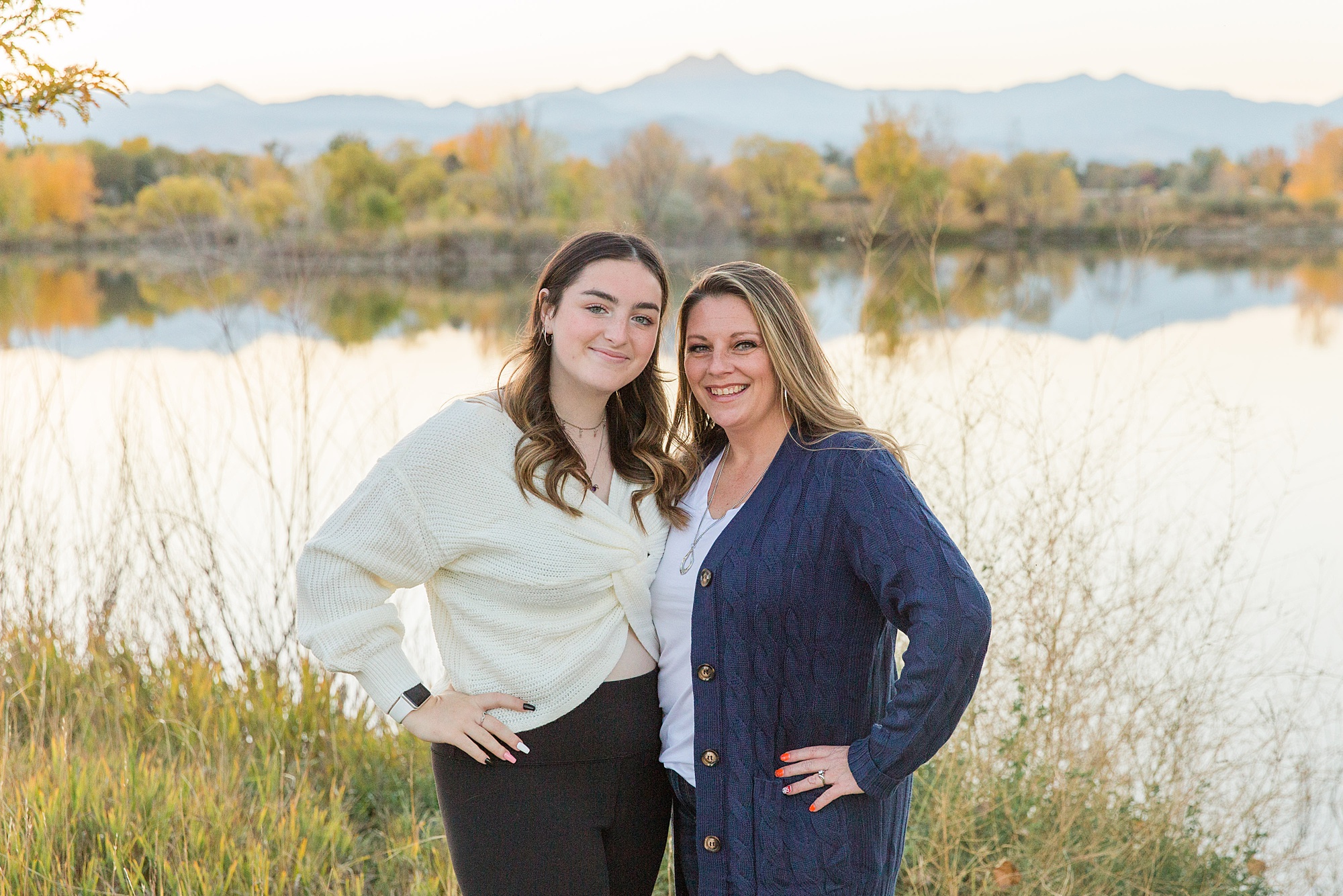 mother and daughter during Golden Ponds Fall Family Portraits by Longmont, CO Family Photographer