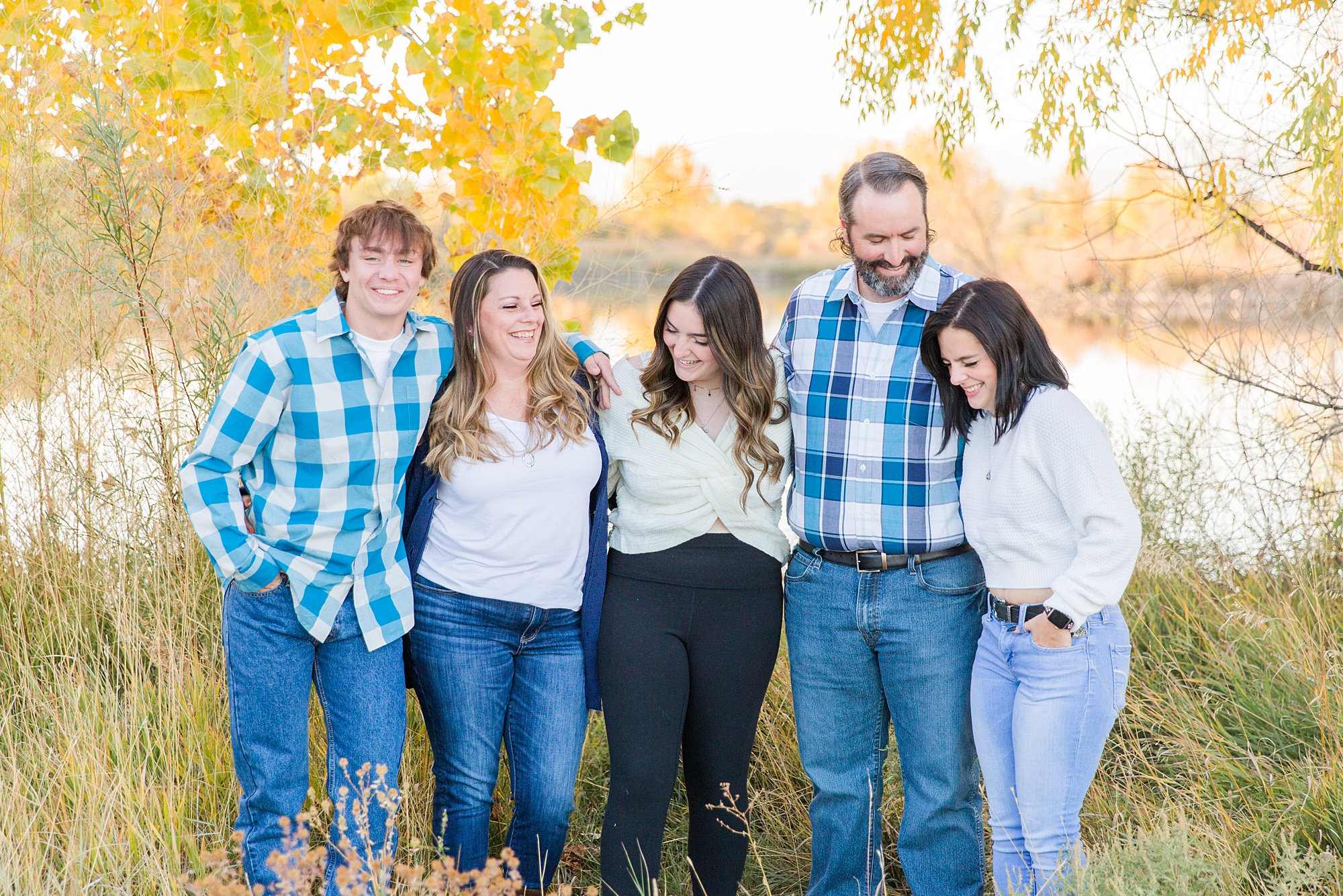 candid fall family portraits by Longmont, CO Family Photographer
