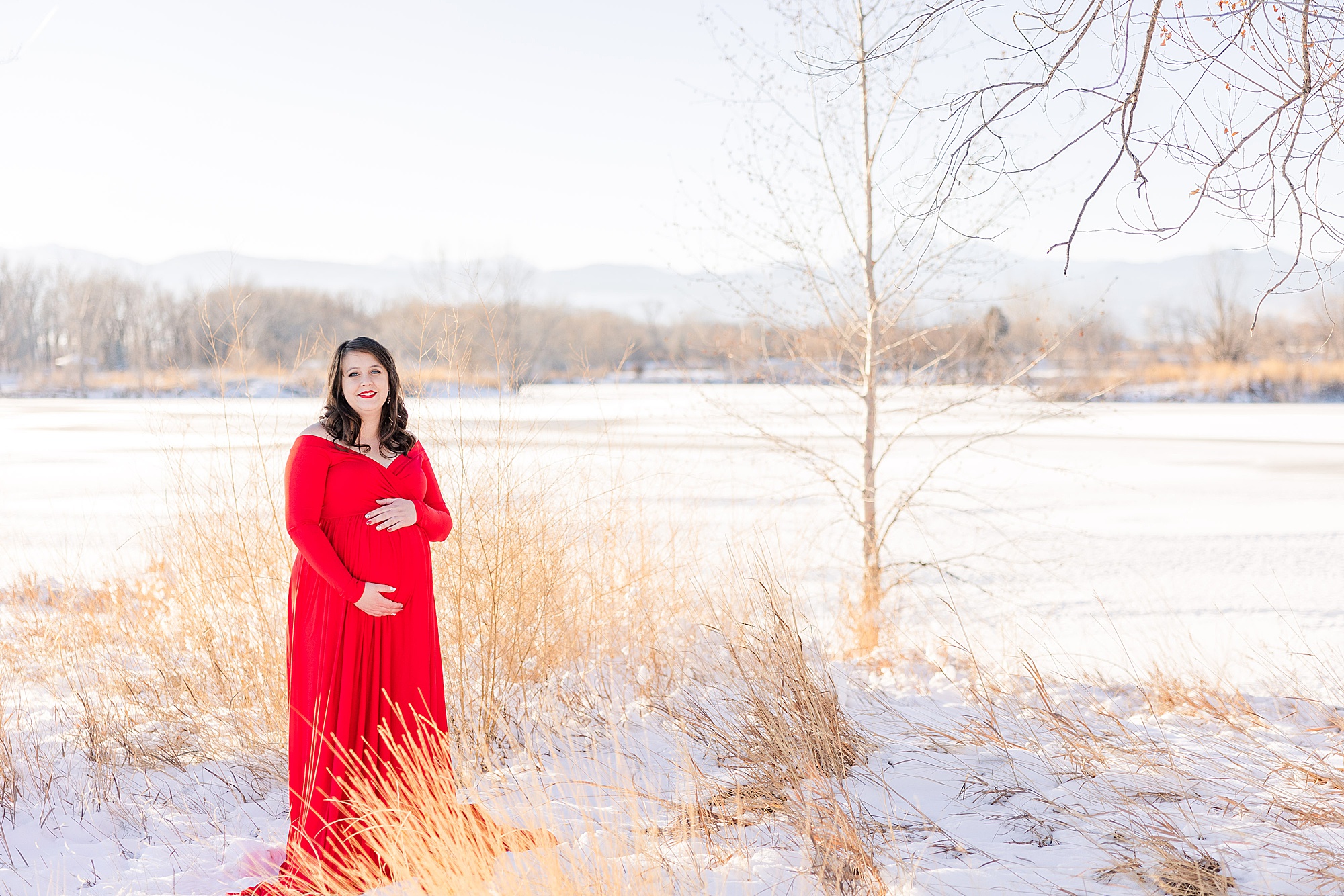 radiant mom to be during winter maternity portraits