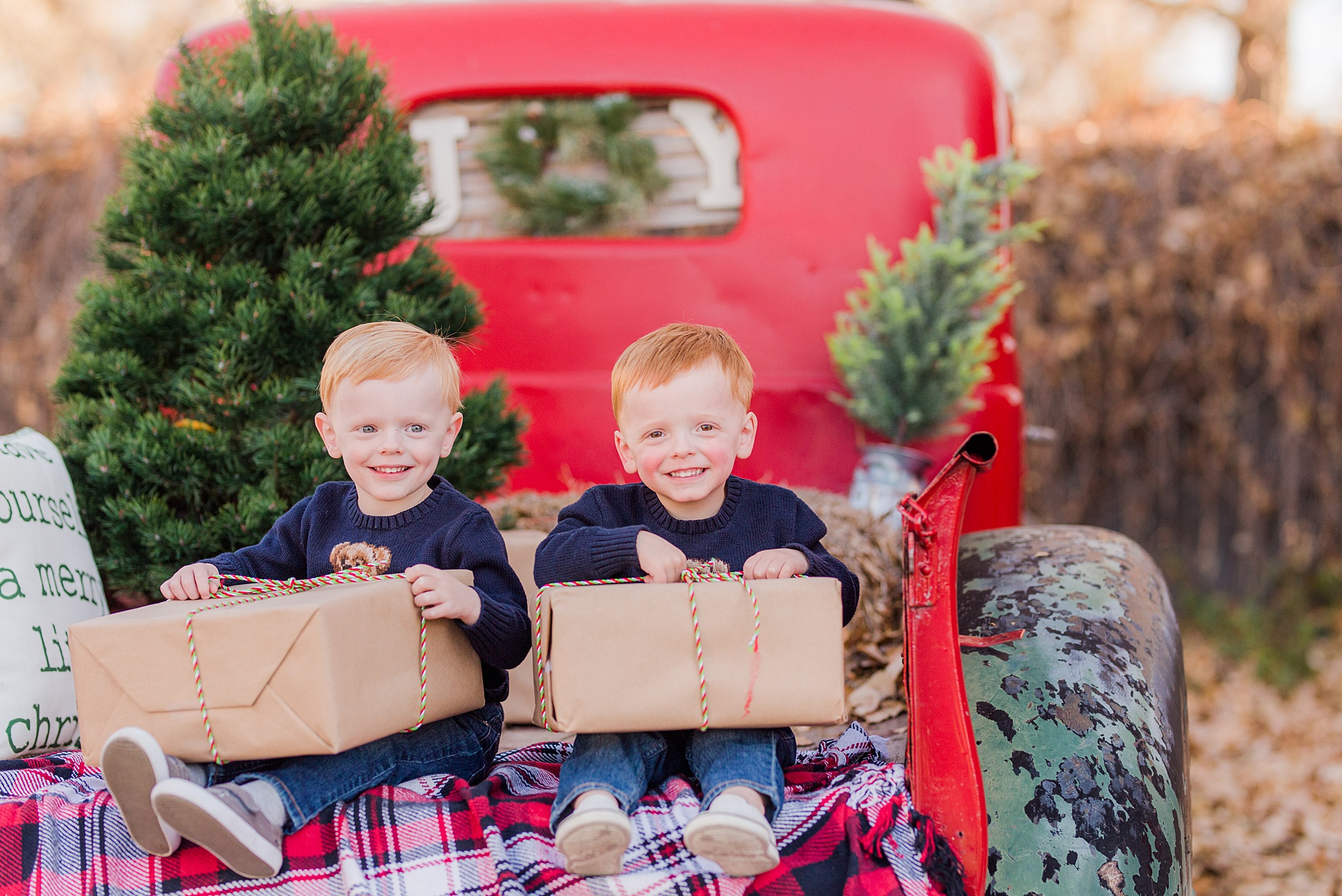 Longmont CO family photographer captures brothers during red truck minis