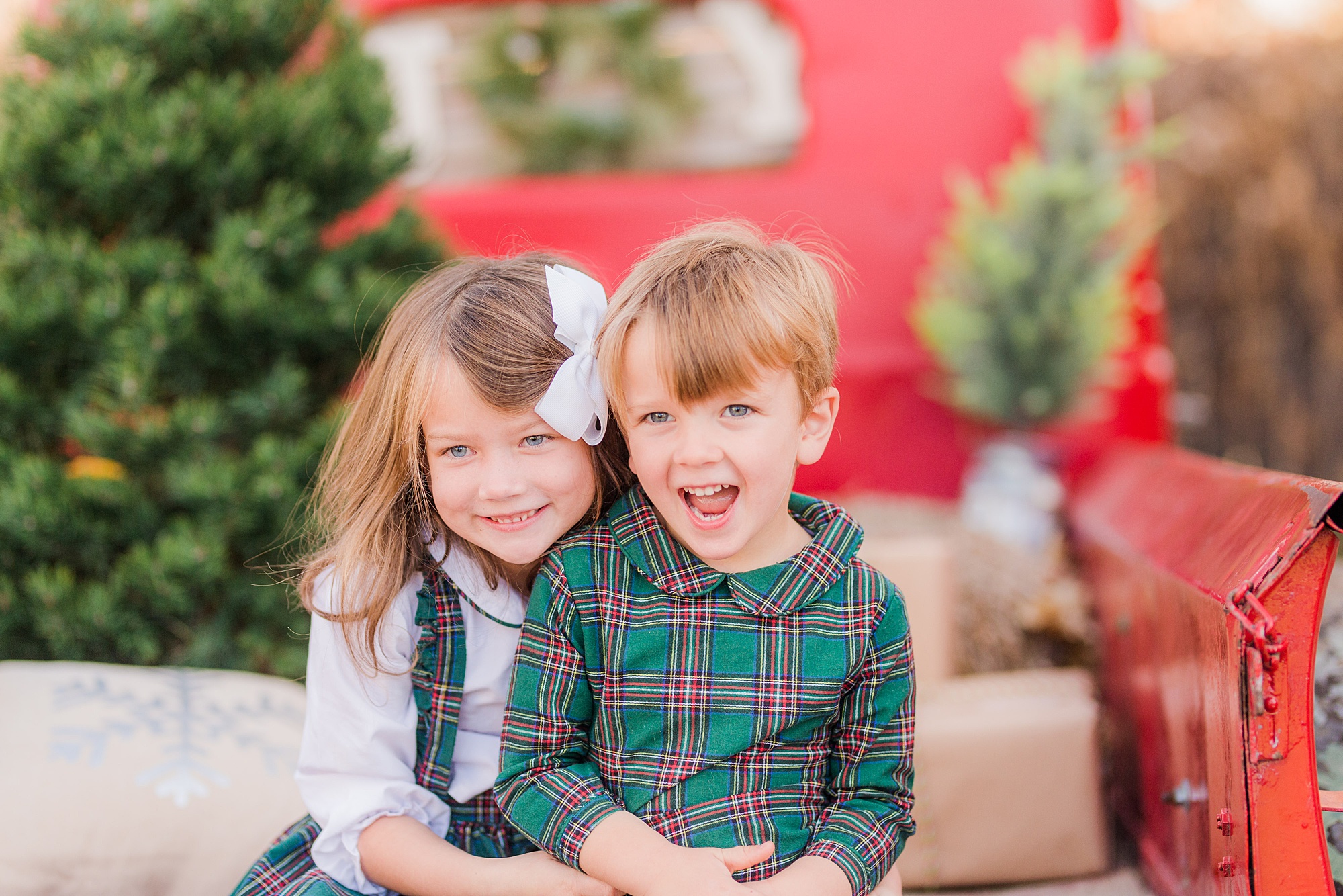 Christmas themed mini session on red truck in Loveland CO