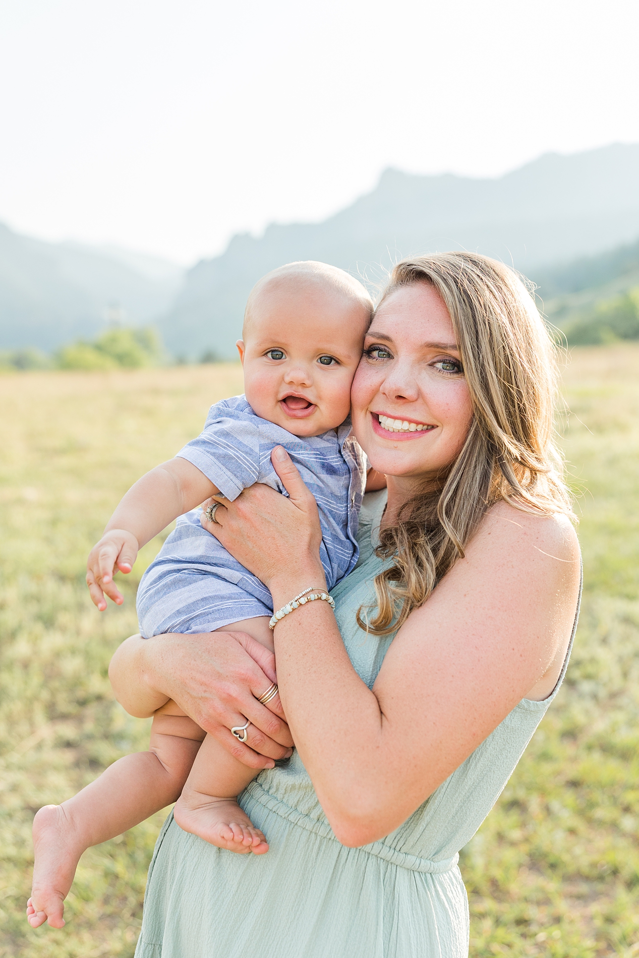 Mom holds baby boy at South Mesa Trailhead, Boulder, CO - Northern Colorado top 10 locations for family photos