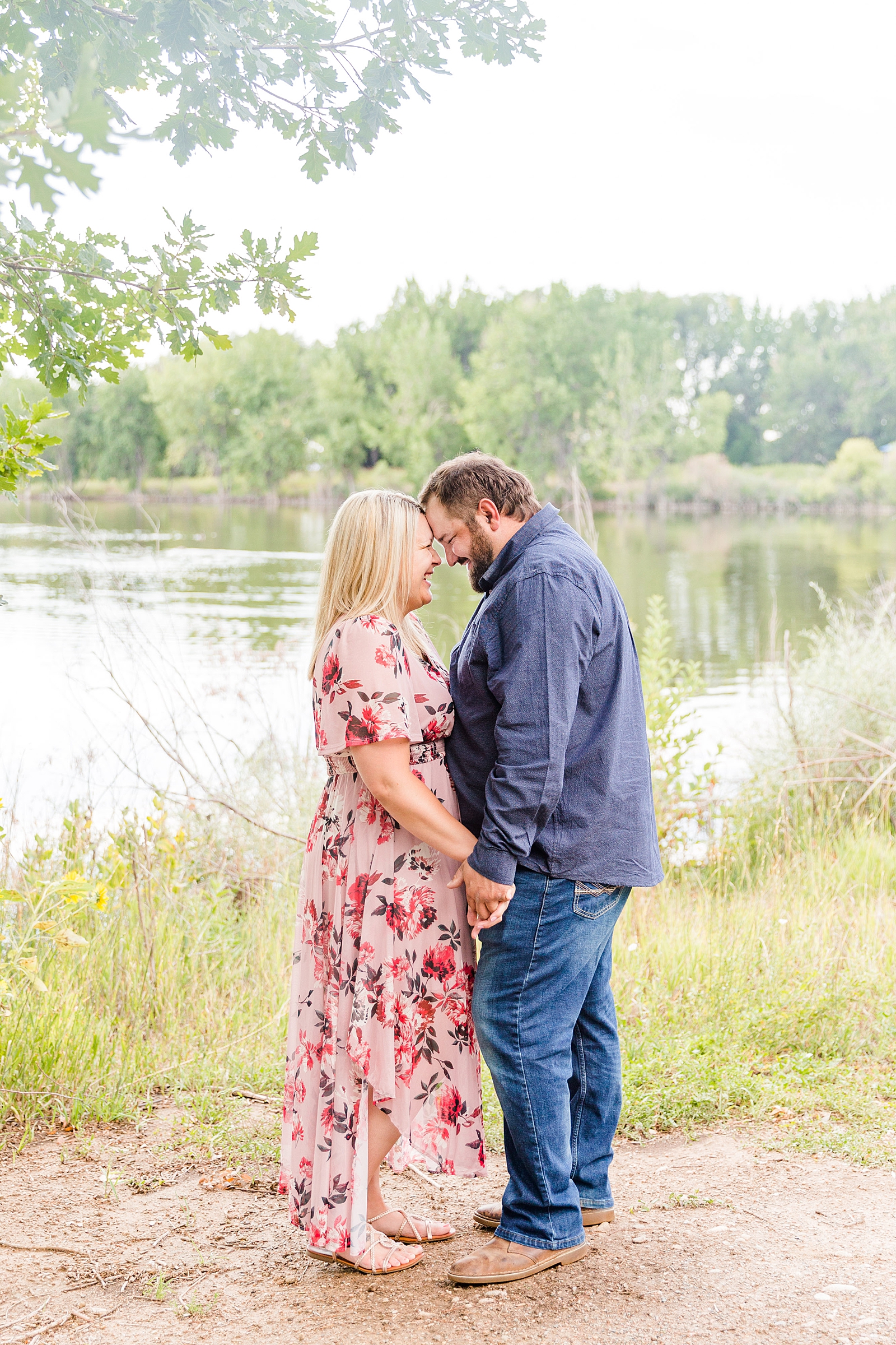 couple by pond in Longmont CO