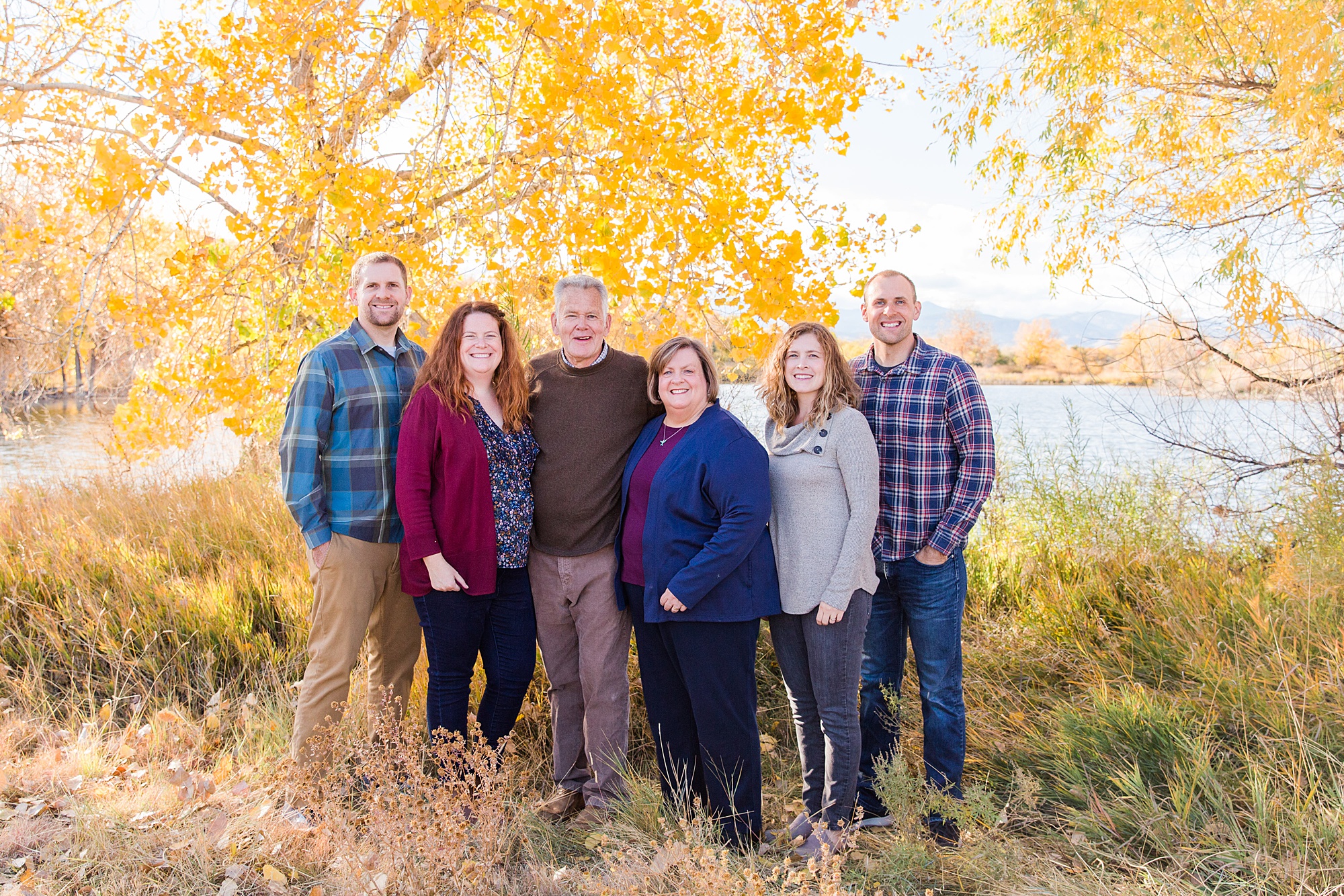 parents with adult children during fall family session
