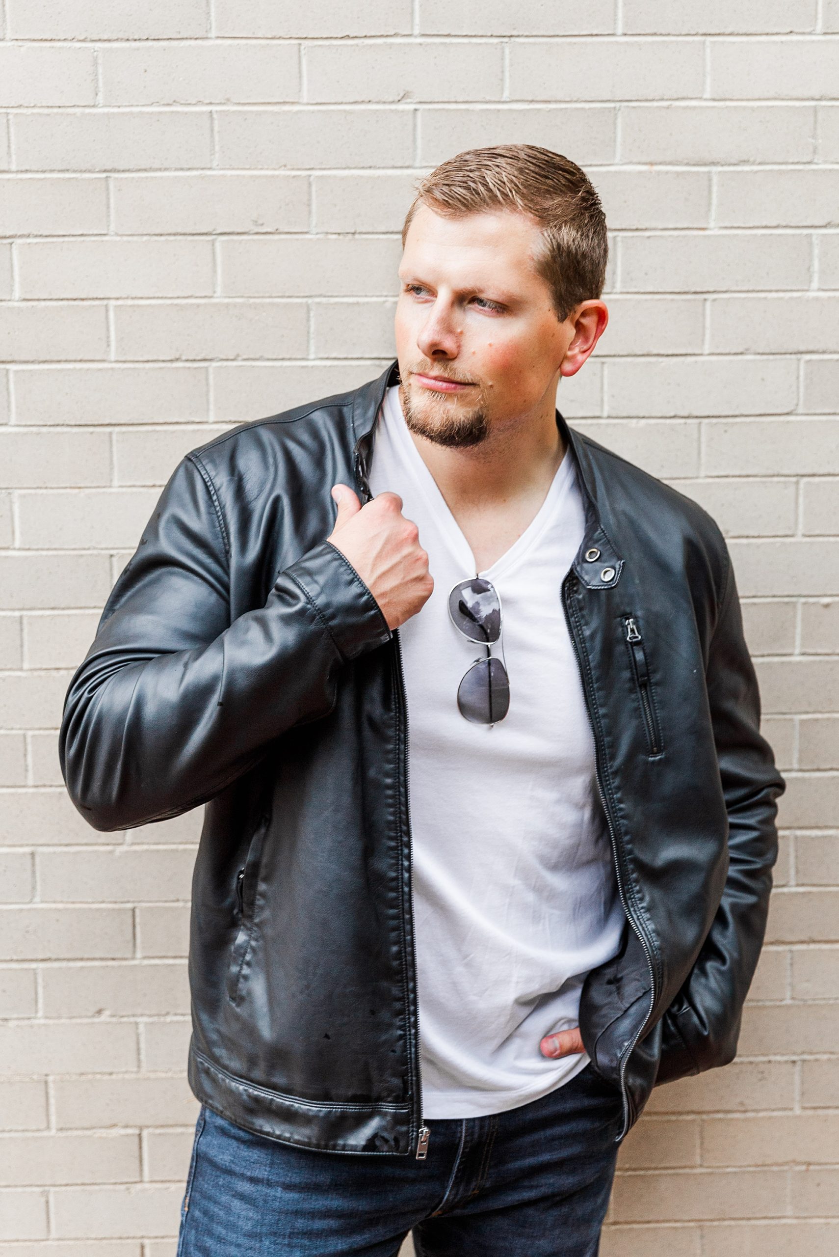 man in leather jacket and white shirt - neutral color palette for photos 
