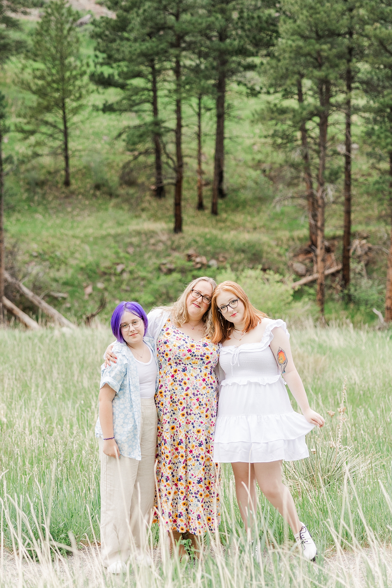 mom with her two daughters during Buckingham Park Family Sessions in Boulder, CO