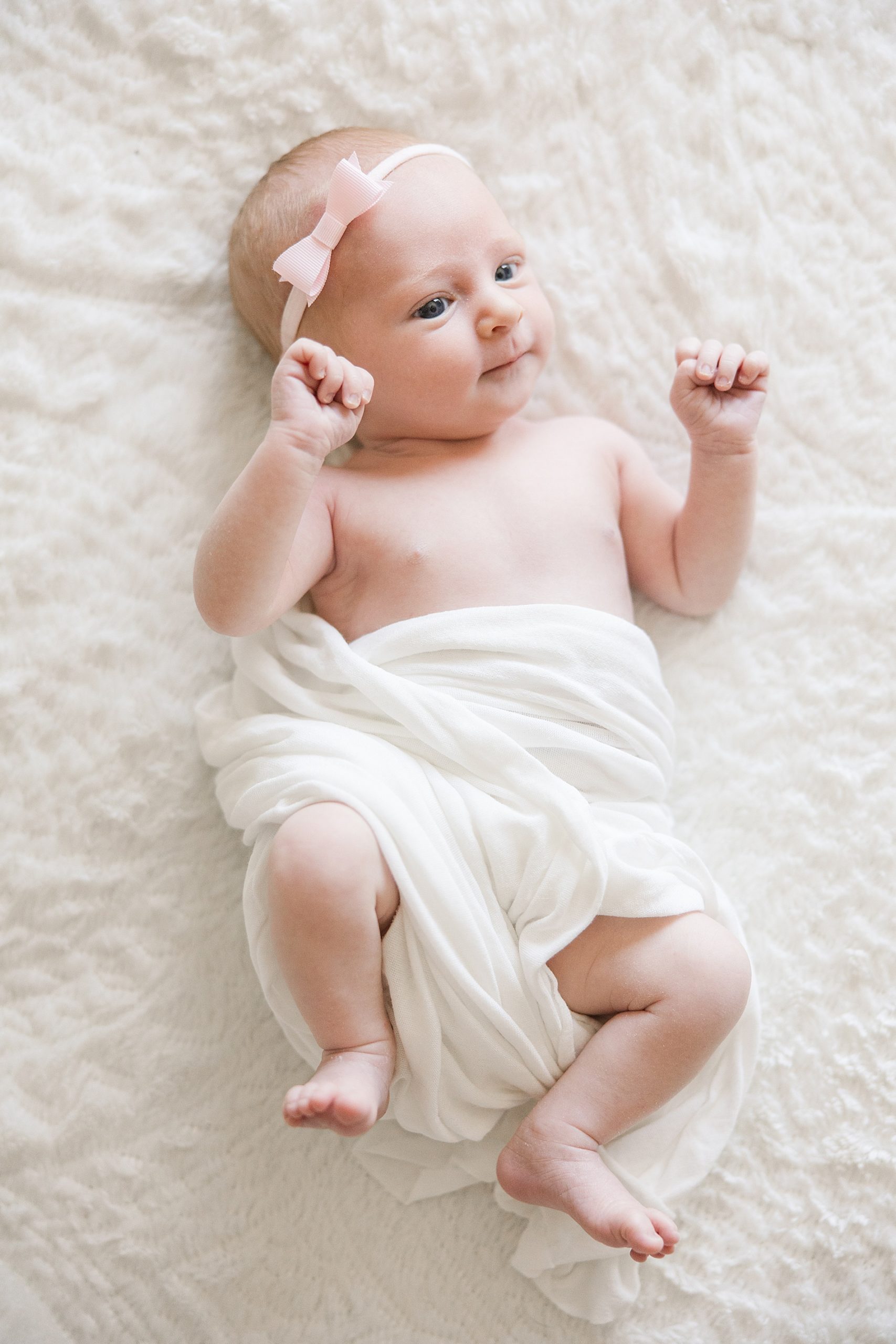 Newborn baby girl in home session by Longmont CO newborn Photographer catherine Chamberlain Photography