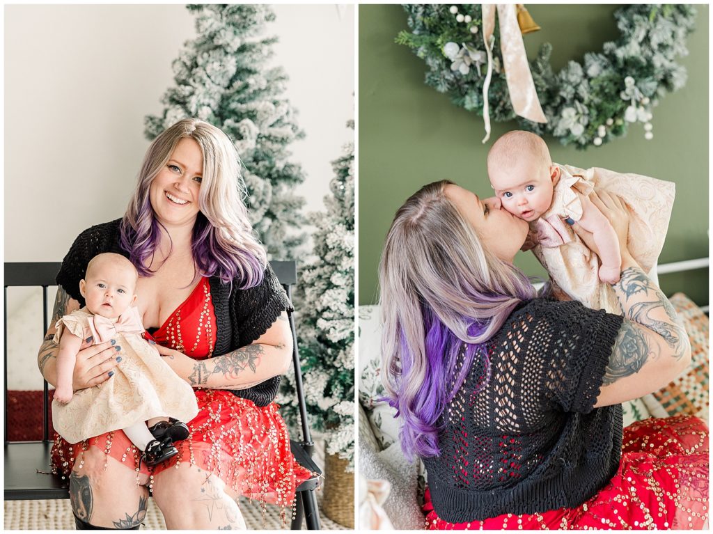 Christmas studio session with mom holding up her daughter kissing her on the cheek