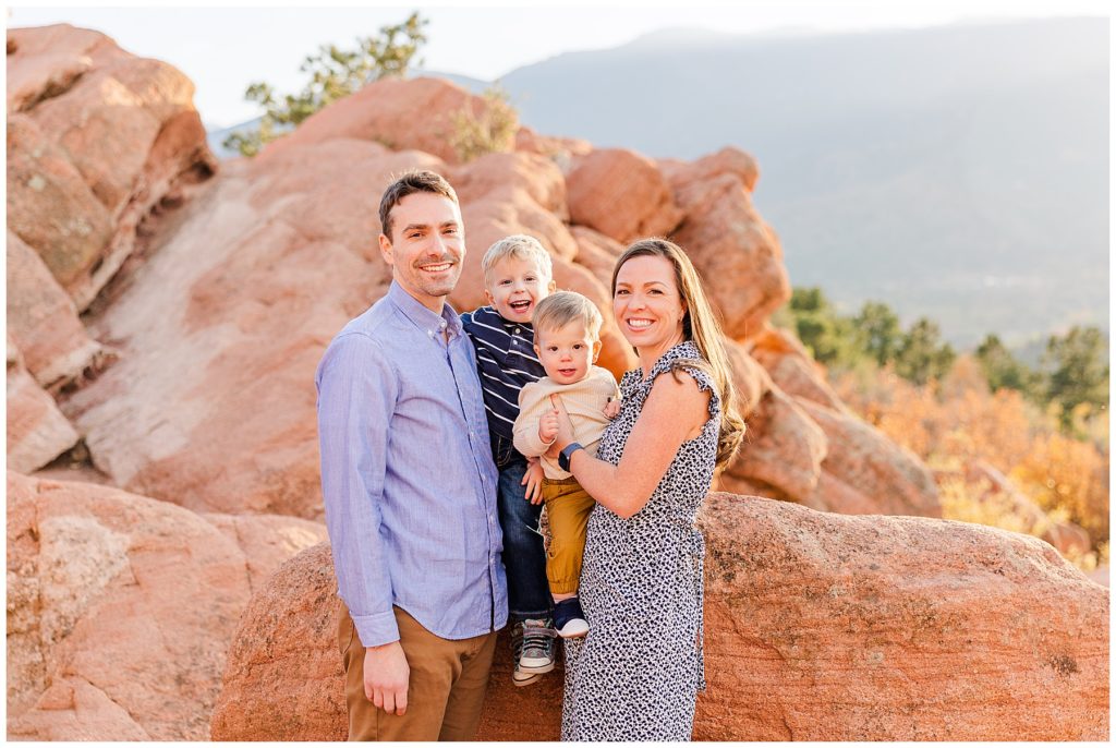 Northern Colorado Family photographer beautifully capture family of four with sandstone rock formation backdrop