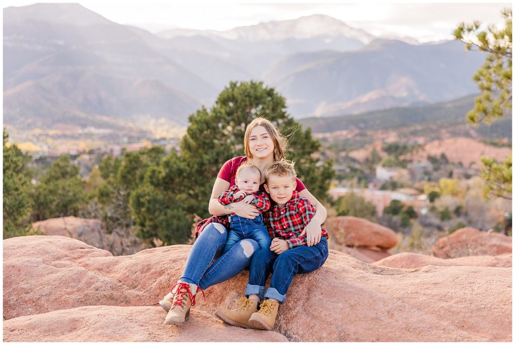 mom and her two young sons pose for light and airy photos at Garden of the Gods