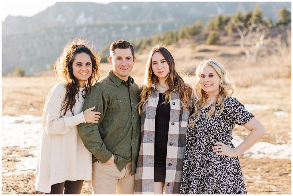 set of four siblings stand for fall session at South Mesa Trailhead for Cohen Extended Family Session