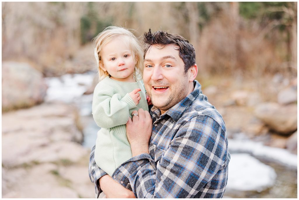 Father holds his little girl during Catherine Chamberlain Photography Shoot