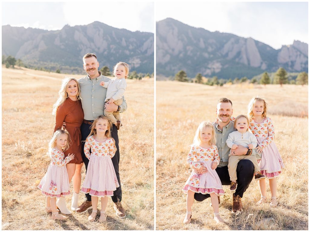 Dad holds youngest son and daughter on his knees while their oldest stands next to him during Boulder outdoor mini sessions