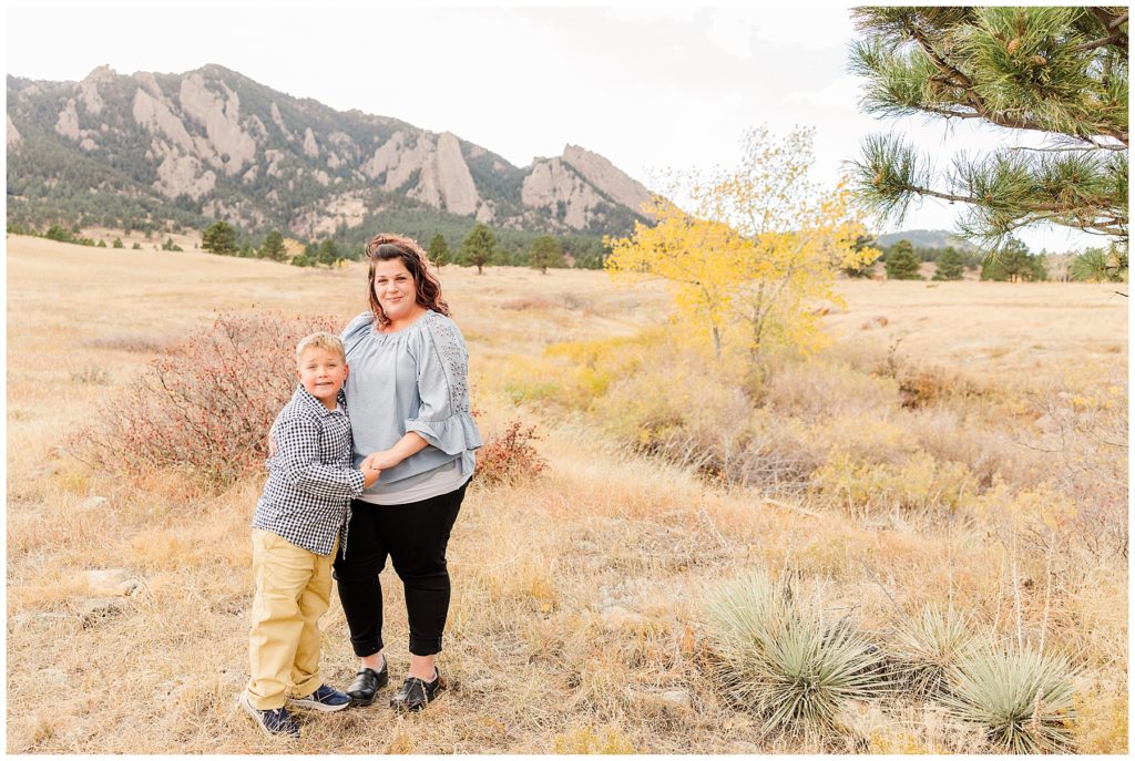 Mom and son hug for fall family photos in Northern CO