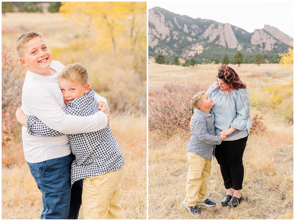 Mother and son hug and hold hands while looking into each other's eyes during a windy mini session