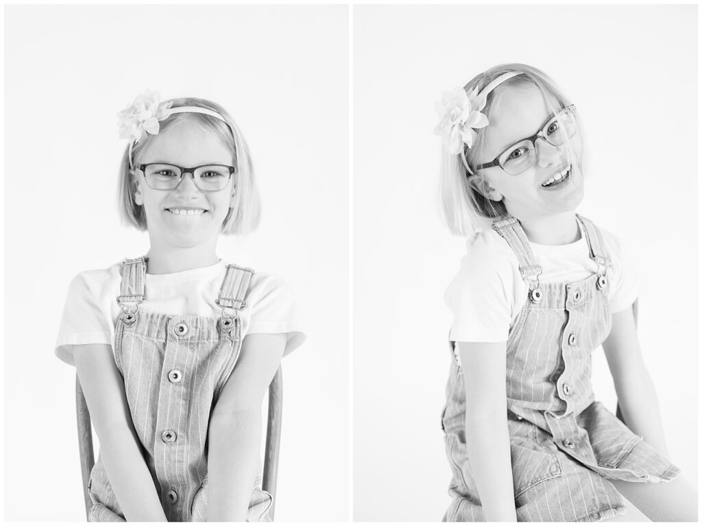 Little girl wearing a headband folds her hands during personality portrait mini sessions