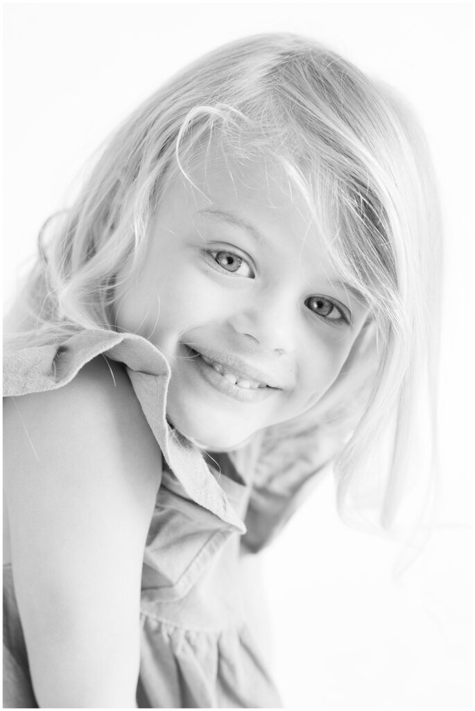 Upclose shot of little blonde girl in Longmont, CO