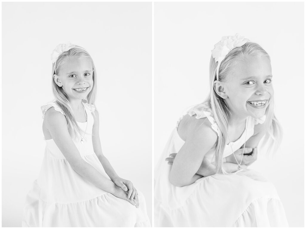 Little girl folds her arms and hunches over during light and airy photoshoot