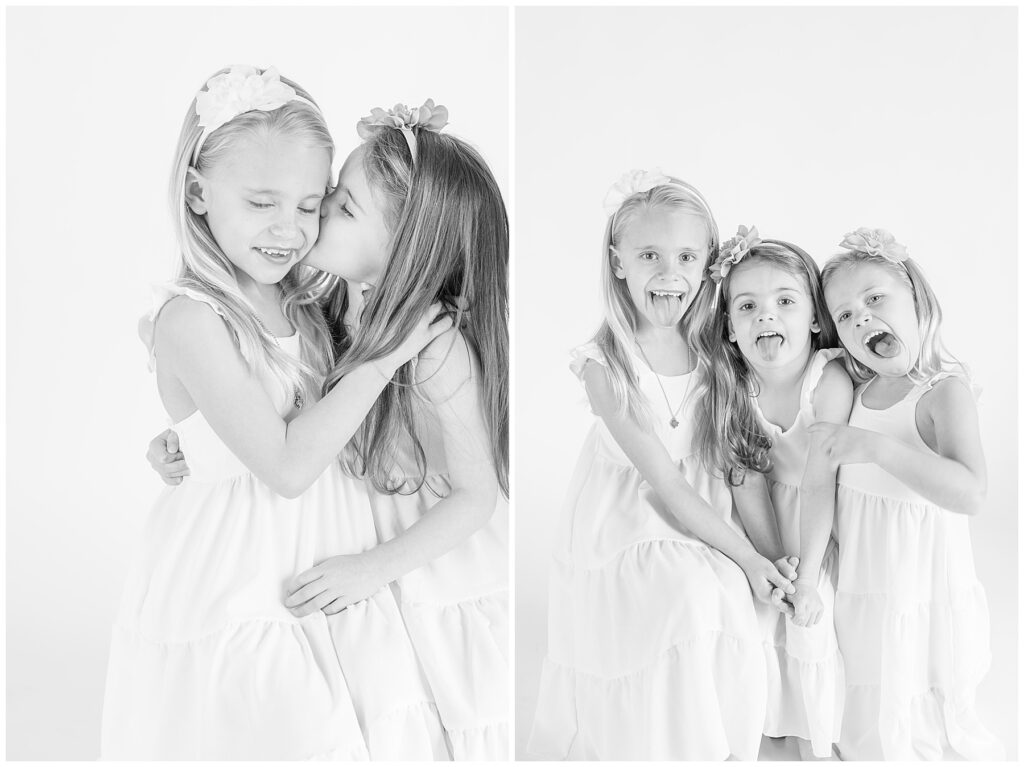 Sister kisses her sister on the cheek during a fun mini session with siblings