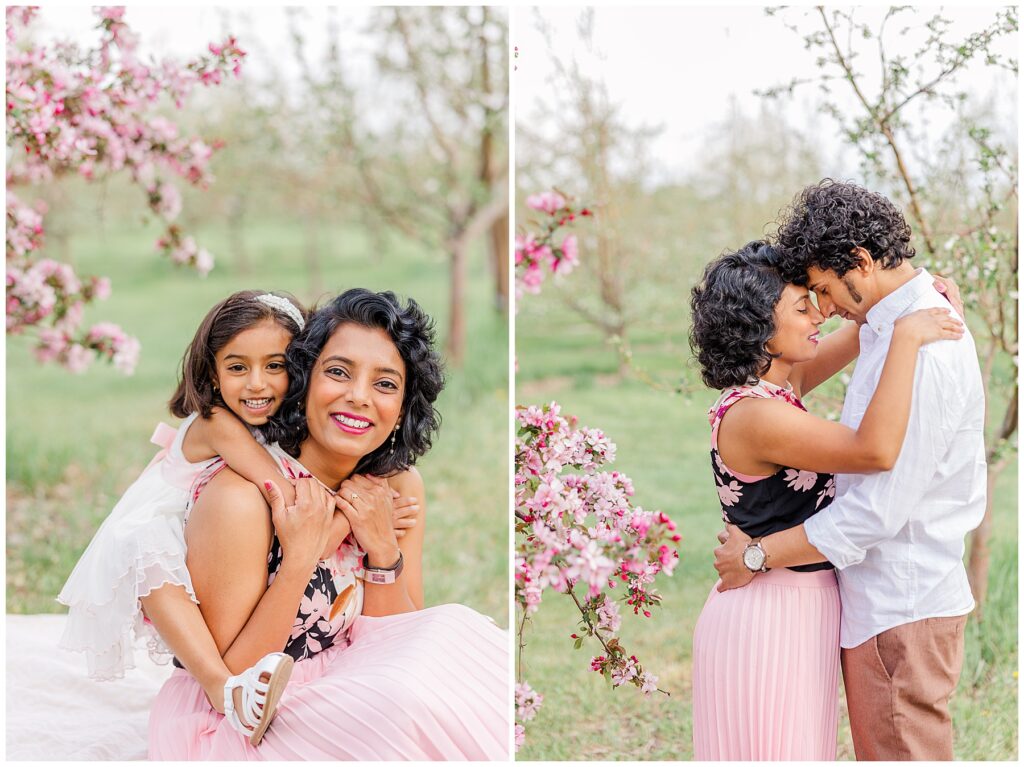Daughter wraps her arms around her mother's neck from behind during outdoor spring mini sessions
