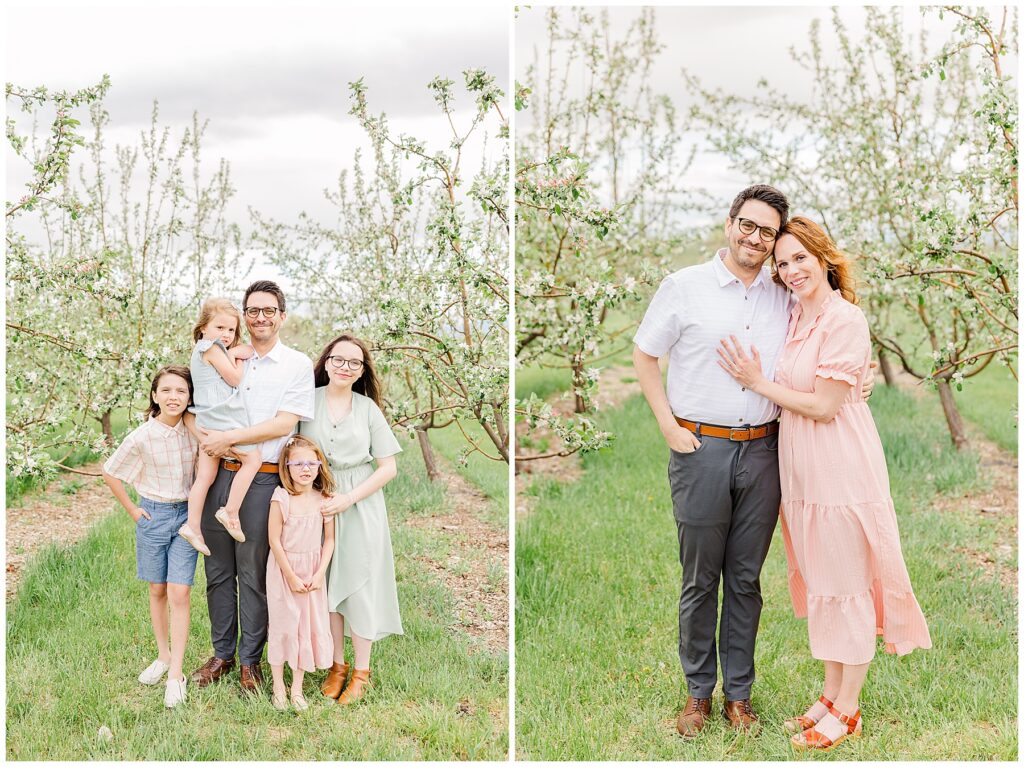 Husband puts one hand in his pocket and the other around his wife for family photos at an outdoor spring mini session in Northern Colorado with Catherine Chamberlain
