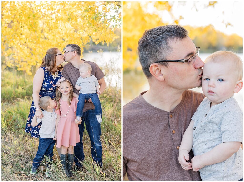 Father kisses his baby on the forehead during Golden Ponds Fall Minis in Longmont, CO