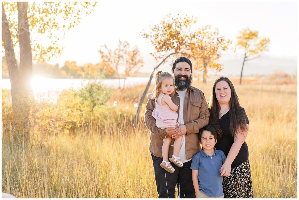 Family of four pose for McIntosh Lake Fall Minis with Catherine Chamberlain Photography