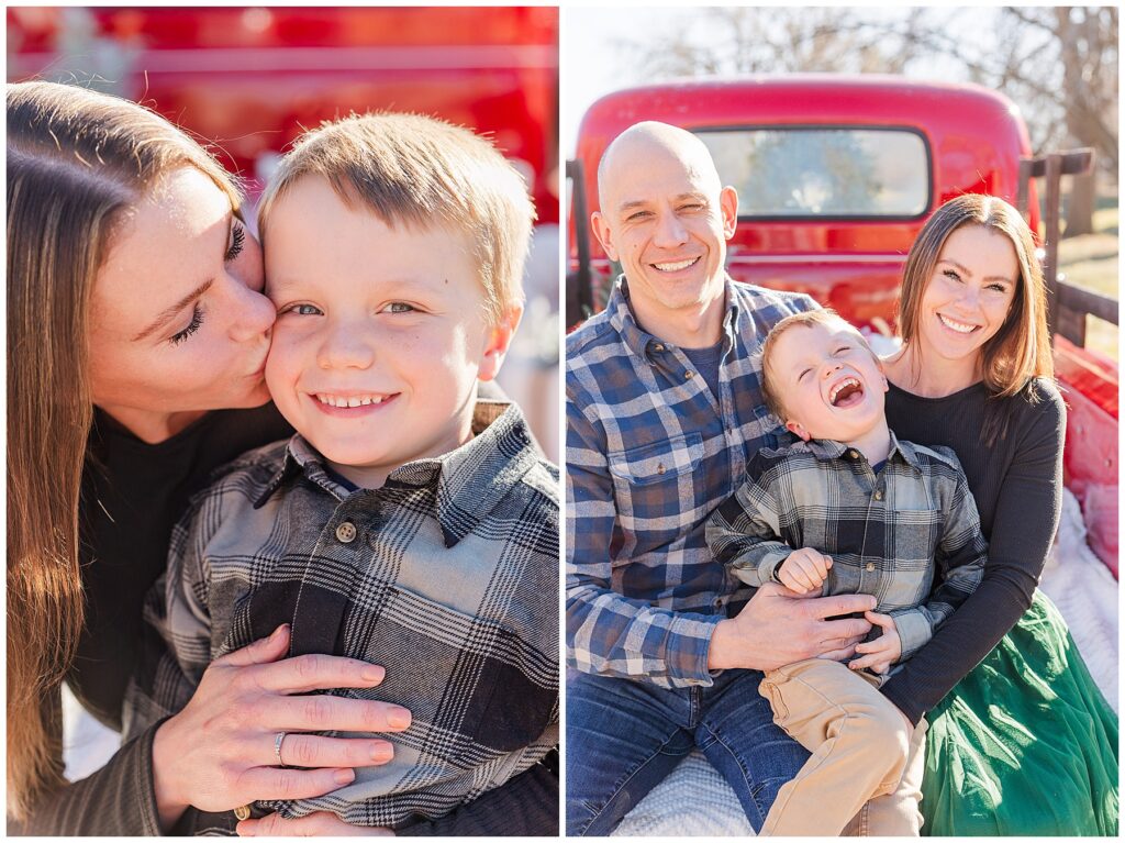Little boy laughs while sitting in his parents lap during Christmas photos outside