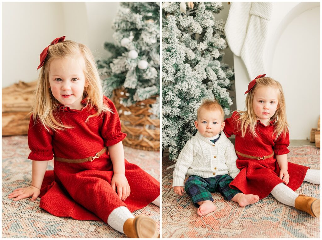 Brother and sister sit in front of a Christmas tree for studio minis at Sughar Hill Studio in Longmont, CO