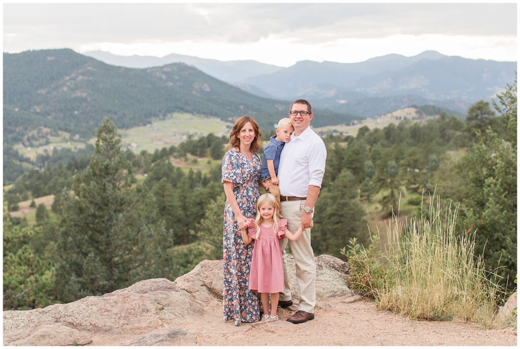 Catherine Chamberlain Photography's family portrait with a beautiful mountainous landscape for a backdrop.