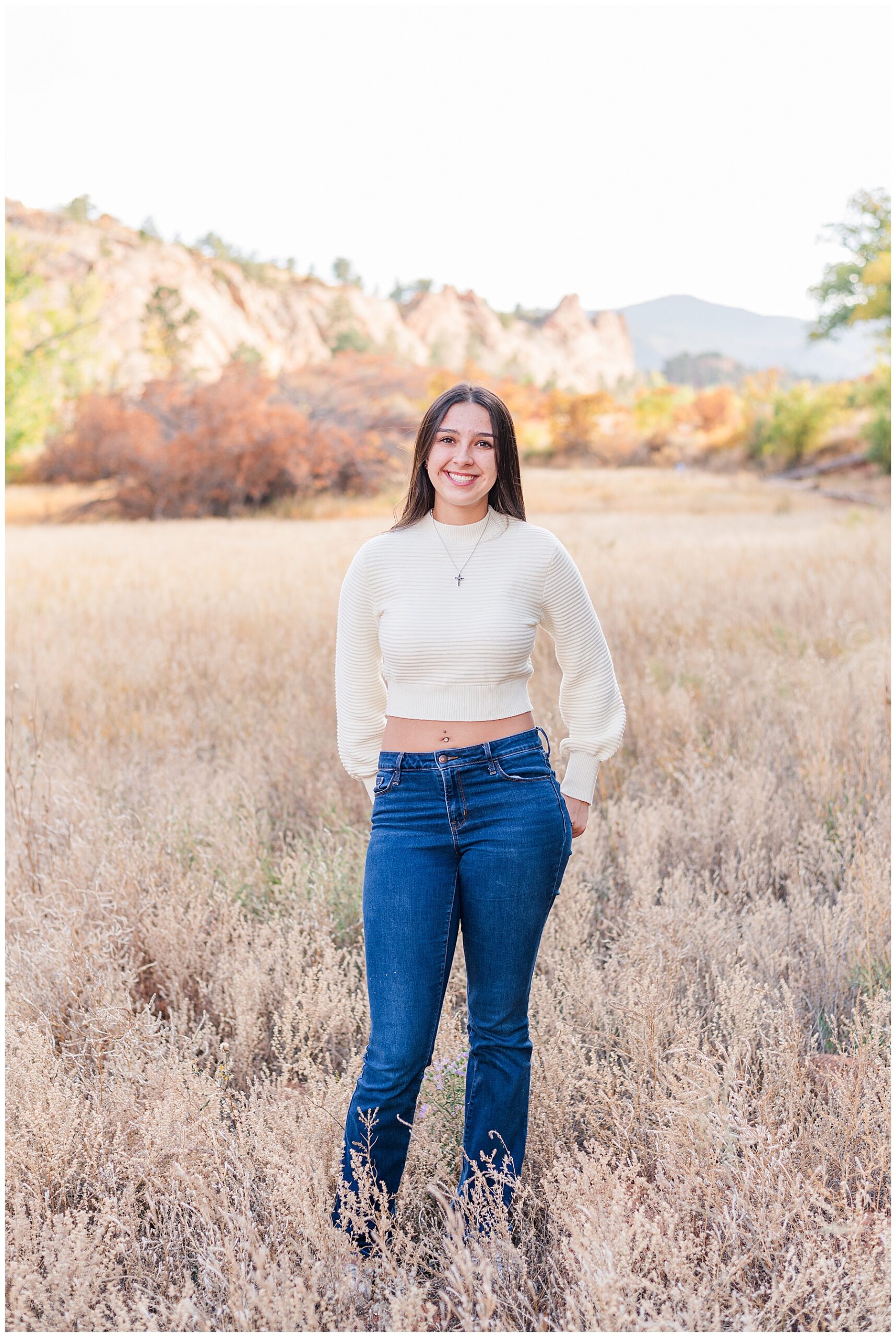 Senior poses outdoors for Colorado Springs Senior Session at Red Rocks Open Space