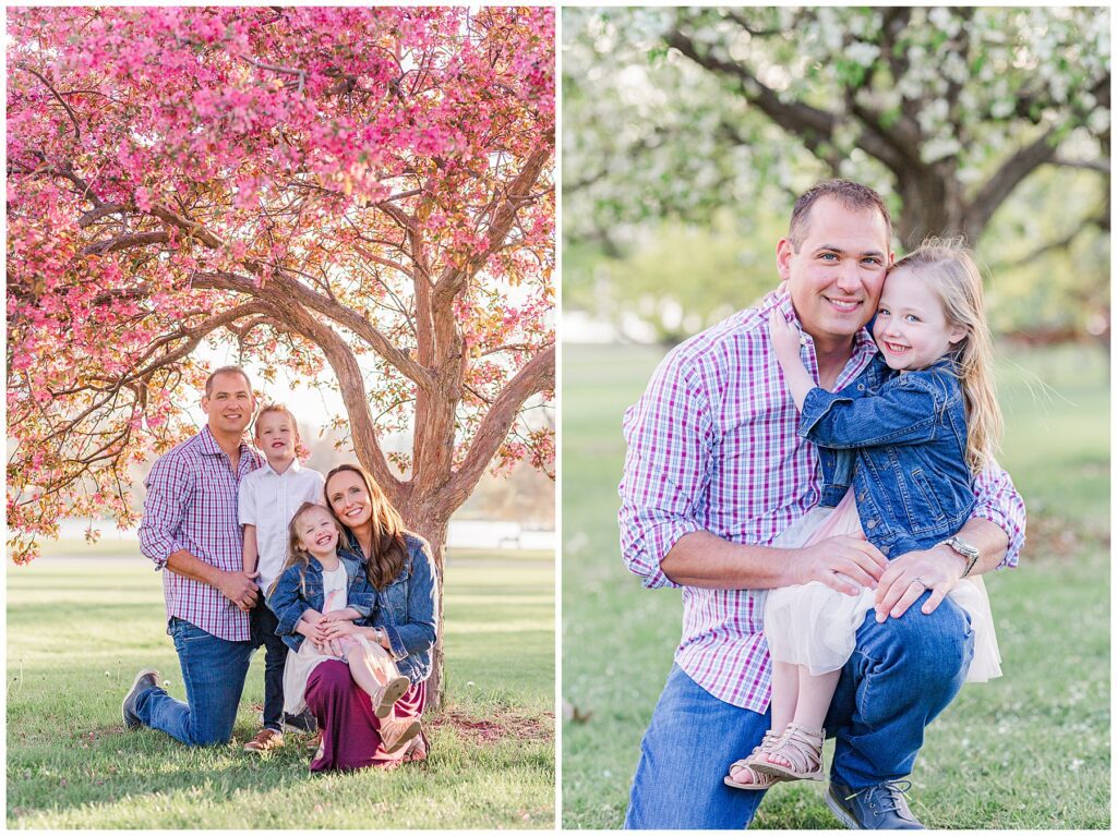 Daughter sits on dad's knee as he squats on the ground for spring photos
