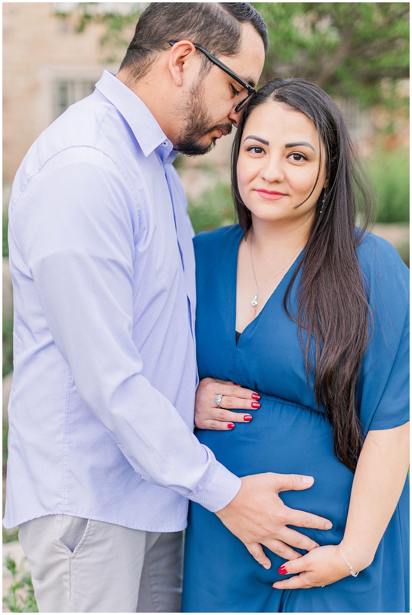 Close-up shot of an expecting couple at Highlands Ranch Mansion session