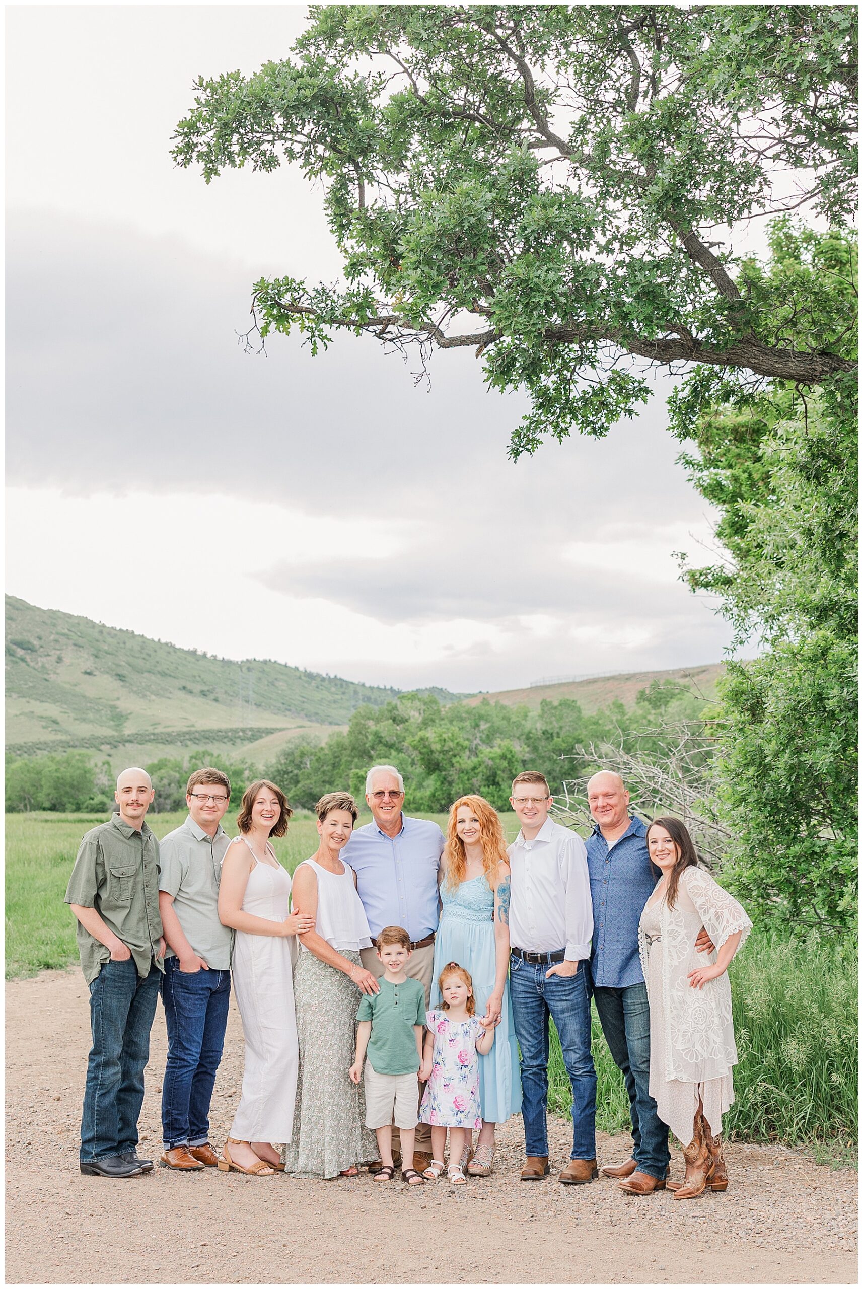 Extended family pose for light and airy outdoor photos