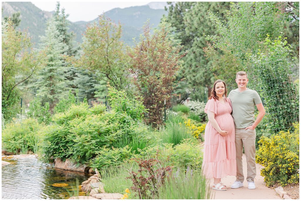 Couple pose for light and airy maternity photos with Catherine Chamberlain Photography