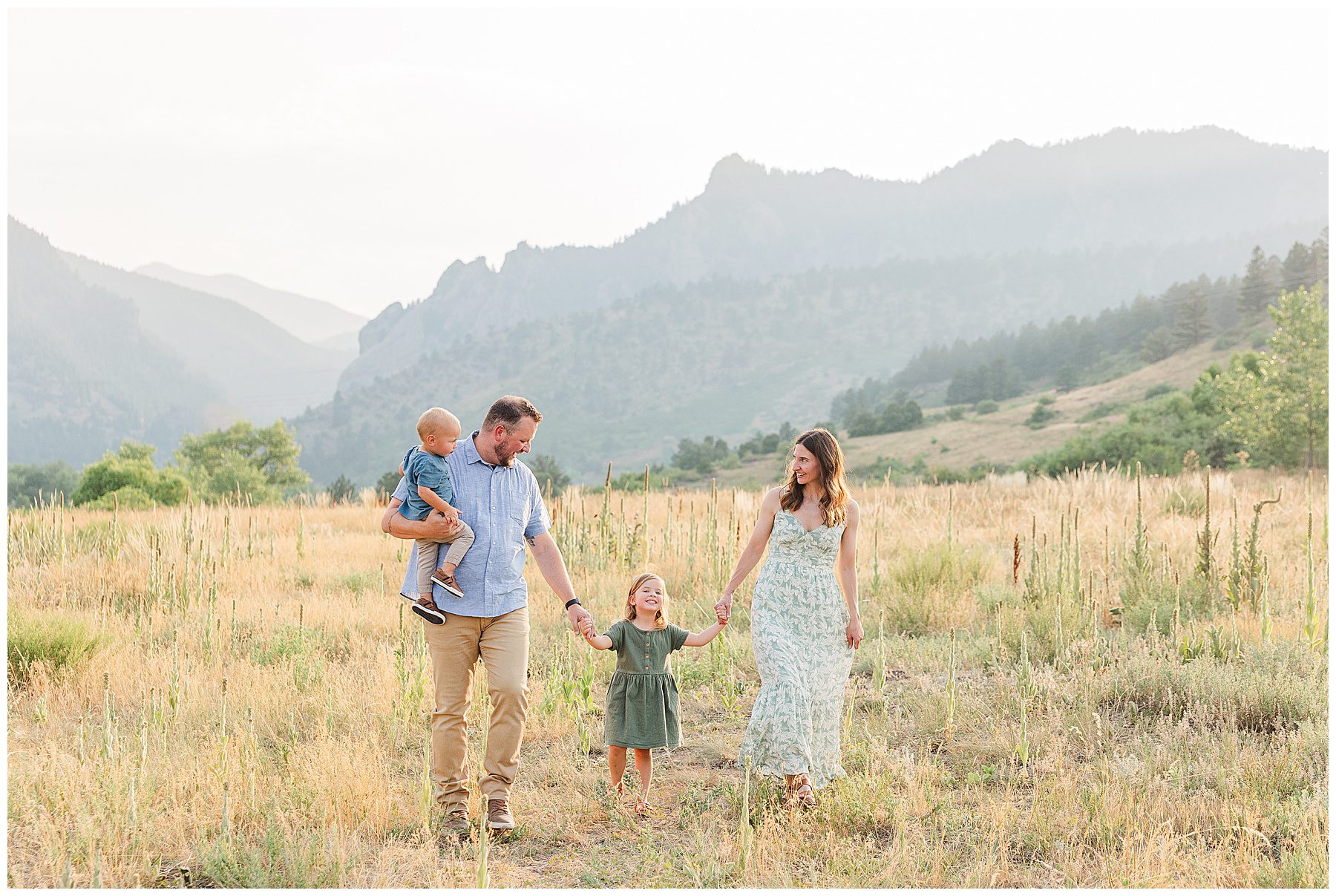 Family walk together at the South Mesa Trailhead in Boulder for family photos with Catherine Chamberlain Photography