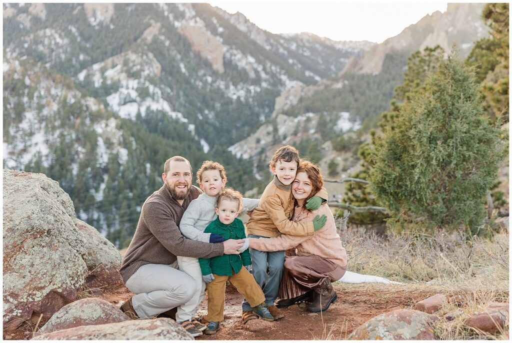 Family of five pose for winter session