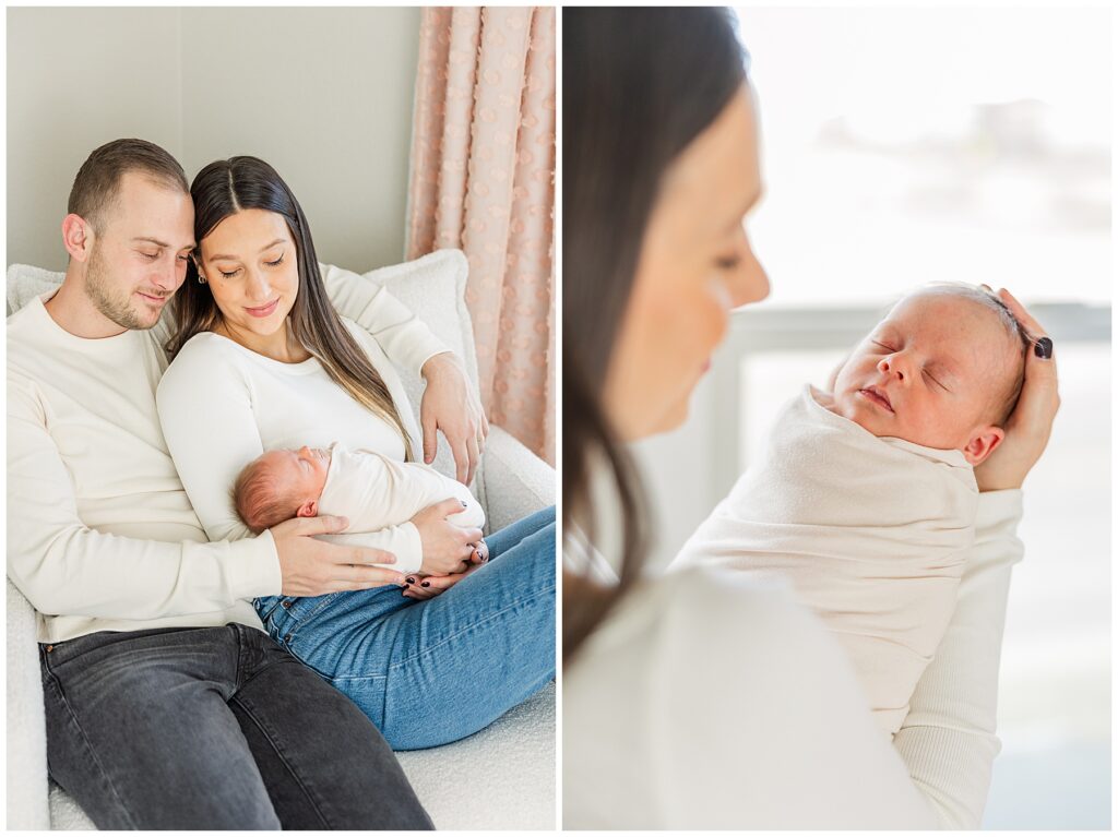 Mom looks down at her bundled baby in natural lighting