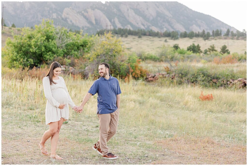 couple poses for light and airy photos with family photographer Catherine Chamberlain from Longmont, CO