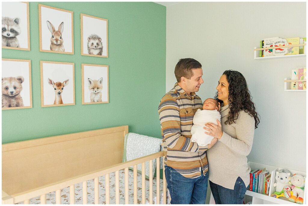 Family pic with newborn in their nursery